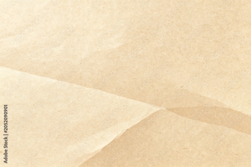 Fototapeta premium Close-up of Crumpled Brown Paper Texture