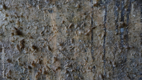Quadro em tela Dried glue stuck on a wall, close-up detail for design background material, Clos