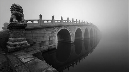 B&W panorama of Lugou Bridge over misty river at dawn. Soft light, silky reflections, and ancient stone lions evoke solemn heritage. Perfect for tourism campaigns with negative copy space.