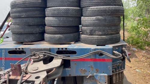 Heavy-Duty Trailer Coupling with Stacked Spare Tires for Industrial Transport