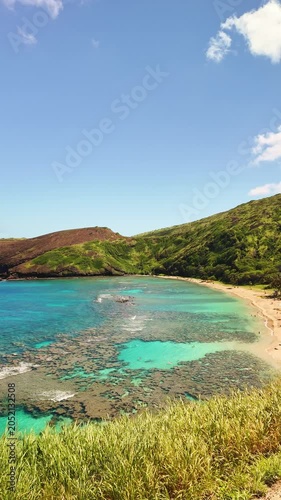 Pristine ocean water and sandy beach at Hanauma Bay marine sanctuary