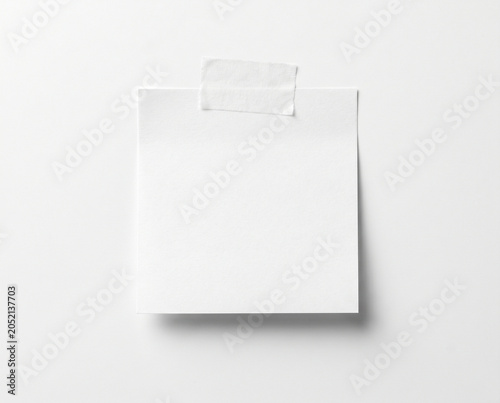Single Blank White Sticky Note with Tape on Isolated White Background