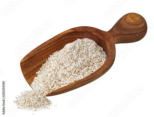 bran in wooden scoop isolated on white