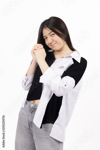 Young happy expressive girl showing emotional lifestyle gestures in studio