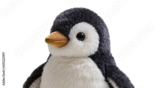 фотографія Fluffy plush penguin toy with golden beak and black eyes