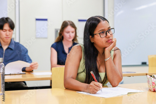 International University Students Studying in Campus Classroom