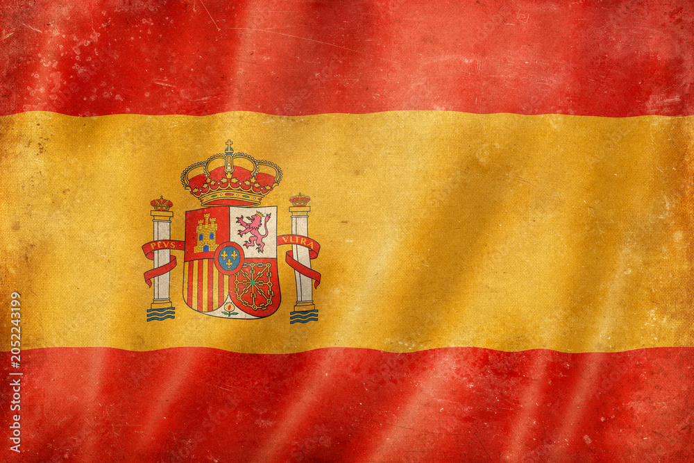 Fototapeta premium Old vintage flag of Spain, worn and stained