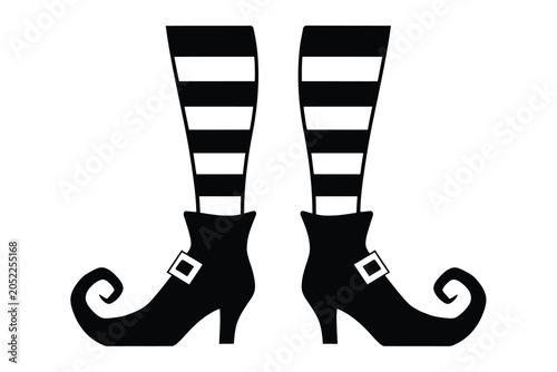 Witch s legs and pointed shoes black silhouette on white background