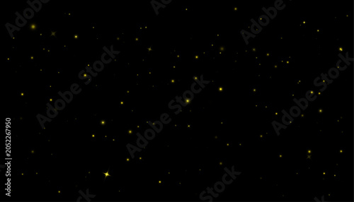 Obraz na plátně Yellow glitter sparkles with magical fairy dust effect and twinkling star particles on black background