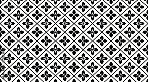 Φωτογραφία Interlocking black and white fleurdelis tile pattern with diamond motifs and repeating symmetry