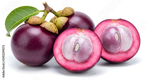 Fresh mangosteen fruit with leaves and slices