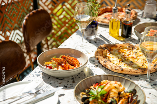 Delightful Culinary Experience Featuring Vibrant Dishes and Fine Wine in a Cozy Setting