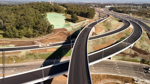 Aerial drone view above the M7 -M12 Interchange at Cecil Hills, Western Sydney, NSW Australia on a sunny morning in June 2026