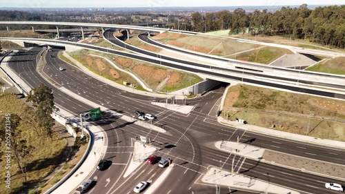 Aerial drone view above the M7 -M12 Interchange at Cecil Hills, Western Sydney, NSW Australia on a sunny morning in June 2026