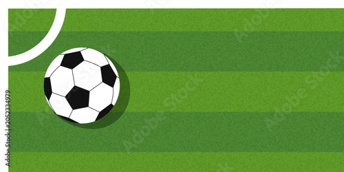 Minimalist sports banner featuring a classic soccer ball near the corner line on a green grass football field background. Vector template with copy space for tournament announcements and match promos