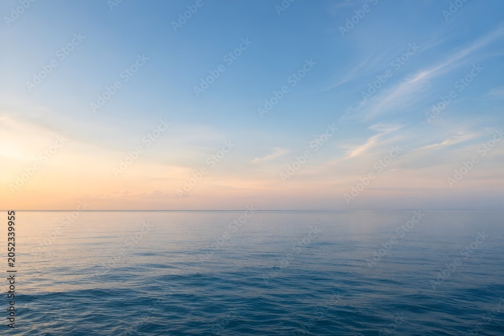 Obraz premium Beautiful calm sea and soft sunset sky horizon background