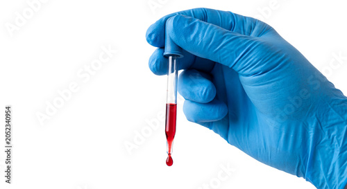 Close-up of scientist holding a blood sample tube in laboratory