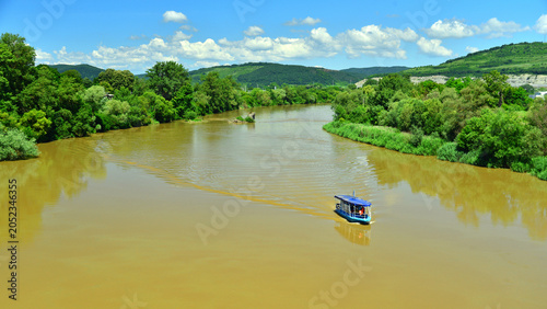 Quadro su tela A tourist boat on the Mures River, near Deva, on a sunny summer day in Transylvania