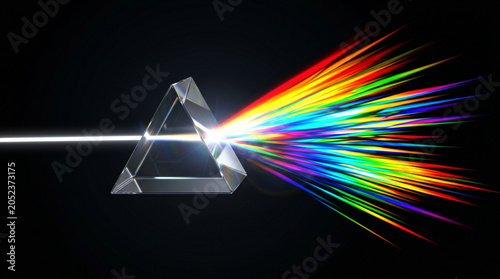 Light dispersion through a glass prism creating a colorful rainbow spectrum on a black background