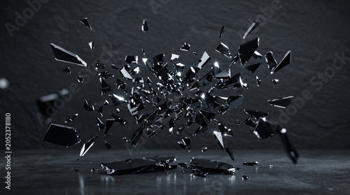 Abstract explosion of black glass shards on a dark textured background