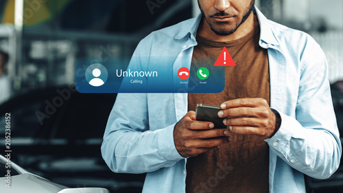 Foto Receiving a scam call notification on a smartphone while standing outside