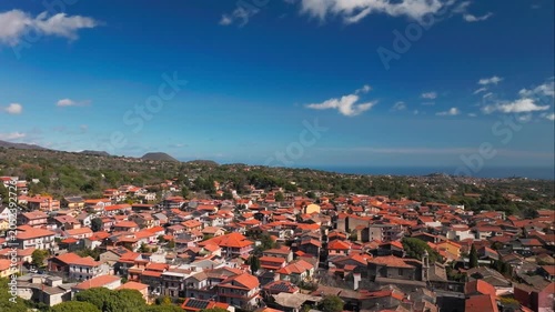 Drone Shot of Picturesque Village Homes Under Mount Etna, Sicily Italy on Sunny Day
