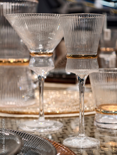 Vászonkép Exquisite crystal wine glasses placed carefully on a table