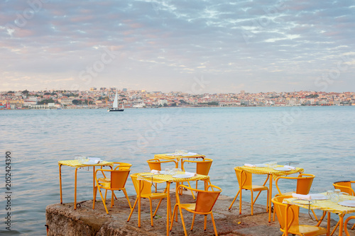Outdoor restaurant Tagus river Lisbon