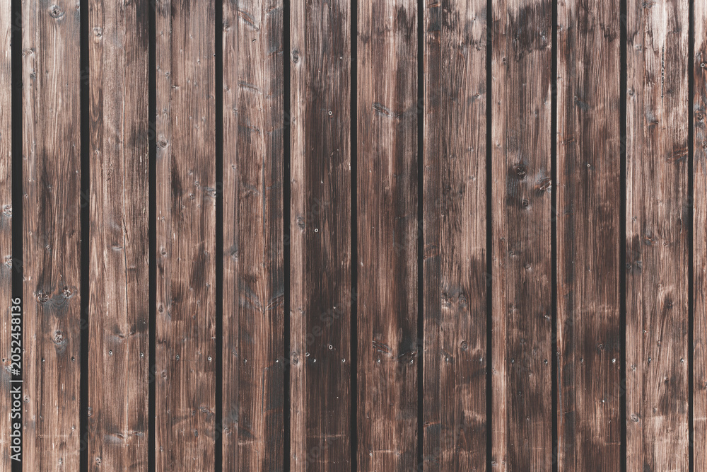 Fototapeta premium Vertical grunge planks, background with warm brown tones and detailed wood grain. Textured wooden boards