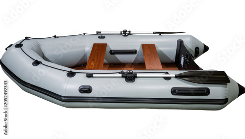 фотографія Gray inflatable boat with wooden floor and paddles