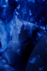 Close up of blue tie dye fabric texture