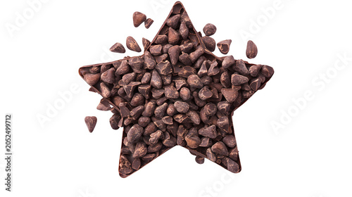 Star shape formed from raw cocoa nibs, healthy dark chocolate ingredient for baking and confectionery, isolated on white background