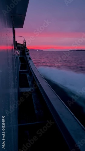Boat Wake at Sunset with Pink and Purple Sky, Vertical Ocean Travel Background 01