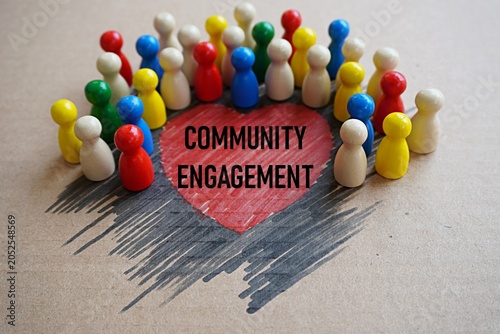 COMMUNITY ENGAGEMENT print. Concept of group cooperation. Discuss together. Make decisions. Cooperate in all matters for mutual benefit. Heart shape figure and shading background