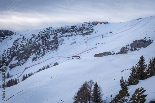 Scenic view of La Nationale Alpine Ski World Cup mens downhill racecourse in Crans-Montana, Switzerland - home of the 2027 Alpine World Ski Championchips against cloudy sky