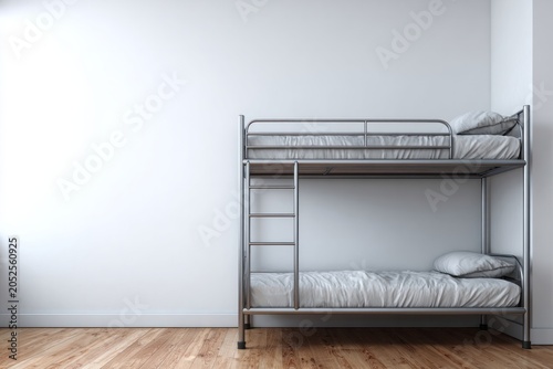 Metal bunk beds with white bedding and pillows stand on a wooden floor.