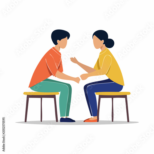 Two people sitting on chairs talking
