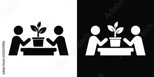 Foto Business growth and startup development icon showing two partners nurturing a plant in a pot over a table