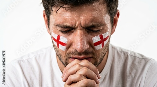 Intense England Fan in Prayer with Face Paint