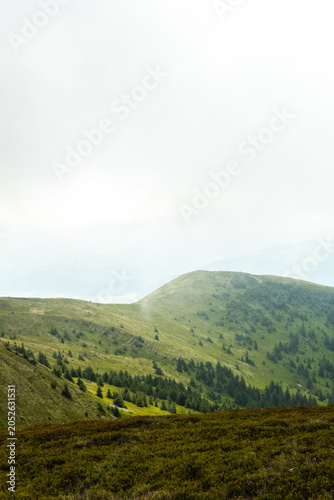 Green Mountain Landscape with Cloudy Sky, Pishkonya mountain range, Carpathians, mountain peak, fog, green silhouettes