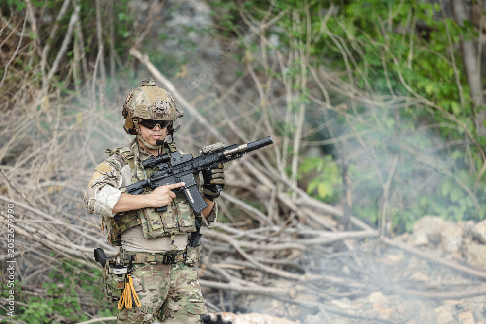Fototapeta premium Military special forces soldier team in combat operation, tactical military portrait in action