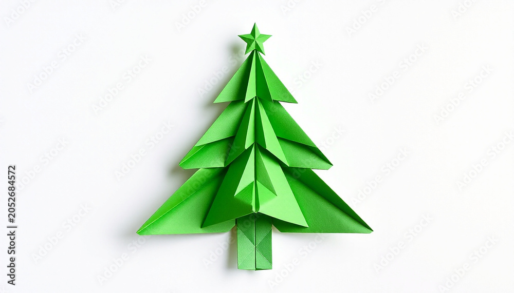 Obraz premium Minimalist Green Origami Christmas Tree Paper Craft on Isolated Background
