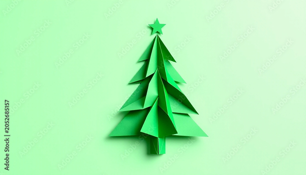 Obraz premium Minimalist Green Origami Christmas Tree Paper Craft on Isolated Background