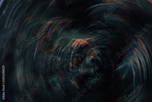 Obraz na płótnie Abstract dark vortex with swirling deep greens and dark blues