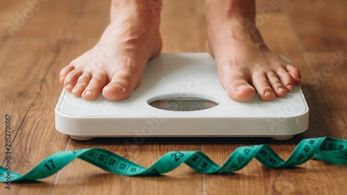 Weight loss, body measurement, scales and tape measure, healthy lifestyle, fitness concept