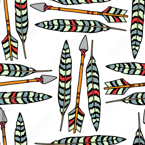 Vector seamless pattern with hand drawn bright patterned feathers and arrows. Beautiful ethnic design elements, ink drawing. Perfect for prints and patterns
