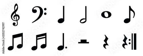 Collection of black musical notes and symbols including the treble clef, bass clef, quarter, half, and whole notes arranged in a neat set for music theory and composition