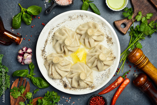 Boiled khinkali with lamb or beef or cheese. Traditional Georgian dish khinkali. Hinkali on a plate.