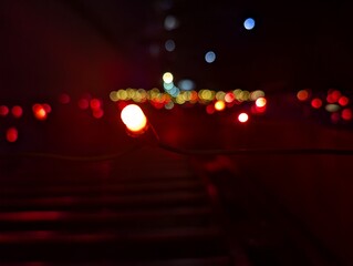 Abstract red holiday lights with glowing bokeh background for festive designs