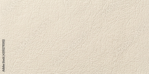 Tableau sur toile A close-up macro shot reveals the intricate, textured surface of pale beige leather, showcasing its fine grain and subtle imperfections